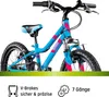 A close-up, front-facing view of a blue children's bicycle with pink accents, set against a white background with a green strip at the bottom. Text and icons describing features are present below the bicycle. Produktbild-Vorschau