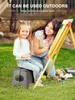 A mother and daughter are painting outdoors with an easel and art supplies. Produktbild-Vorschau