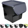 A black storage container with a gray lid is shown against a white background. Below the main product image, there are smaller images of the same container in different colors. Anteprima dell’immagine prodotto