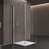 A modern shower cabin with glass doors and a chrome shower fixture. Voir les images du produit