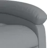 A close-up view of a grey fabric armchair. Náhľad obrázku produktu