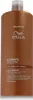 A brown bottle of Wella Ultimate Smooth Shampoo against a white background. Produktbild-Vorschau