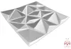 A white, geometric 3D wall panel is shown against a white background. Produktbild-Vorschau
