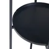 A close-up view of a black metal plant stand with a circular shelf. Voir les images du produit