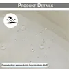 Close-up of a beige fabric with water droplets on it, indicating a waterproof feature. Produktbild-Vorschau