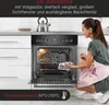 A woman is cleaning the inside of a built-in oven. The oven is open and a baking rack is visible. A teapot is on the counter behind the oven. Produktbild-Vorschau