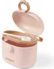 A pink baby milk powder container with its lid open, showing a scoop inside. Produktbild-Vorschau