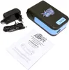 A power bank, charging adapter, and instruction manual are laid out on a white surface. Produktbild-Vorschau