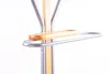 A close-up shot of a coat rack with a wooden tray and metal bar. Anteprima dell’immagine prodotto