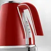 A close-up view of a red electric kettle, focusing on the water level indicator and handle. Produktbild-Vorschau