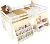 A white loft bed with integrated bookshelves and LED lighting. Voir les images du produit
