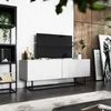 A modern living room with a TV stand, TV, and decorative items. Produktbild-Vorschau
