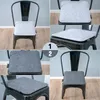 A collage of images showing a black metal chair with gray felt seat cushions from different angles. Produktbild-Vorschau