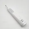 A white electric toothbrush on a white background. Produktbild-Vorschau