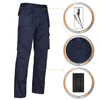 A pair of navy work pants with inset diagrams highlighting features. Produktbild-Vorschau