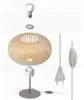 An exploded view of a table lamp, showing its components and accessories. Produktbild-Vorschau