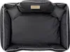 A top-down view of a black dog bed with white trim and two small pillows. Anteprima dell’immagine prodotto