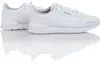 A pair of white Puma sneakers shown from a side angle with their reflection on a white surface. Anteprima dell’immagine prodotto