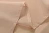 A close-up of a folded sheer curtain with a weighted hem. Produktbild-Vorschau
