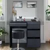 A vanity table with a mirror and stool, set up in a room with a window. Náhľad obrázku produktu