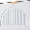 A close-up view of a white cabinet door with a semicircular ribbed panel and a gold handle. Anteprima dell’immagine prodotto