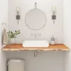 A modern bathroom vanity with a live-edge wood countertop. Voir les images du produit