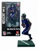 A Lamar Jackson Baltimore Ravens action figure in its packaging and displayed outside the packaging. Anteprima dell’immagine prodotto