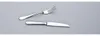 A fork and a knife are placed on a plain gray background. Náhled obrázku produktu