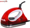 A red and white electric iron on a white background. Podgląd zdjęcia produktu