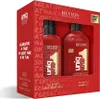 A red gift box containing two Revlon Uniq One hair products. Náhled obrázku produktu