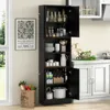 A black kitchen cabinet with its doors open, displaying various kitchen items and food products. A framed poster is on the wall to the left, and a bag of groceries is on the floor to the left. Anteprima dell’immagine prodotto