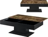 Two views of a coffee table with a wood-look top and black base, one showing the table closed and the other with the top lifted to reveal storage compartments. Anteprima dell’immagine prodotto