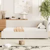 A modern bedroom or living room setting with a beige daybed as the focal point. Anteprima dell’immagine prodotto