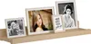 A wooden shelf displaying four framed pictures. Produktbild-Vorschau