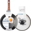 A frying pan and a pot lid are shown, both in their packaging. The frying pan has a fried egg on it, and the pot lid packaging shows images of pots. Náhled obrázku produktu
