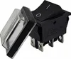 A black electrical switch with a clear protective cover. Náhľad obrázku produktu