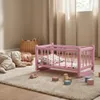 Ein Puppenbett aus Holz, eine rosa Wiege mit grauer Produktbild-Vorschau 7