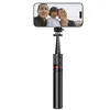 A family taking a selfie with a selfie stick. Produktbild-Vorschau