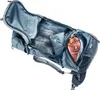 An open backpack showing its interior with packed items. Podgląd zdjęcia produktu
