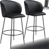 Two black bar stools with metal legs against a white and gray background. Náhled obrázku produktu