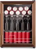A small beverage cooler filled with red cans and glass bottles. Náhľad obrázku produktu