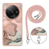 A phone case with a marble pattern and a pink lanyard, shown next to a close-up of the lanyard attachment. Náhled obrázku produktu