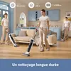 Two women are using cordless wet and dry vacuum cleaners in a modern living room. Produktbild-Vorschau
