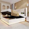 A storage bed with the mattress lifted, revealing storage space underneath, in a bedroom setting. Produktbild-Vorschau
