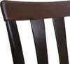 A close-up view of the dark wooden backrest of a dining chair. Náhľad obrázku produktu
