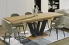 A dining table with chairs in a modern living room setting. Anteprima dell’immagine prodotto