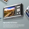 A digital camera is shown from a low angle, with a city highway scene displayed on its screen. Text below the camera describes its features. Produktbild-Vorschau
