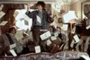 A scene from Harry Potter and the Sorcerer's Stone where letters are flying into a room, overwhelming the occupants. Podgląd zdjęcia produktu