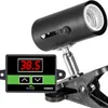 A close-up shot of a reptile lamp with a digital thermostat display. Anteprima dell’immagine prodotto
