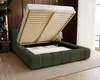 A bed with its storage compartment open, showing the mattress and slatted base, in a bedroom setting. Náhled obrázku produktu